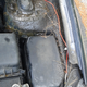 The ‘extension cable’ that runs from the switch in the car to the relay in the engine bay was carefully run around the strut tower and ziptied to some cables next to the strut tower and one of the mounts for the fender. You can see where it plugs into the engine bay side of the harness just at the bottom corner of the fusebox there and is covered with the little rubber sheath to prevent it from grounding out on anything.